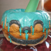teal-pumpkin-cake-face